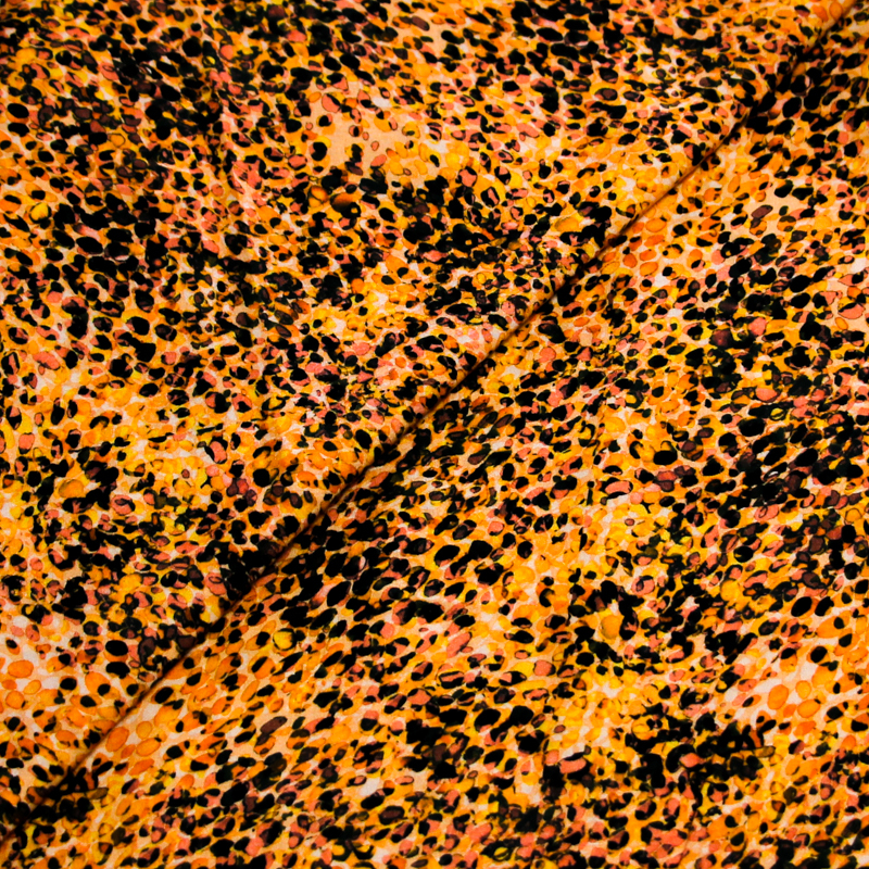 Étoffe 100% viscose - Tache orange