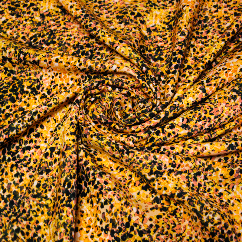 Étoffe 100% viscose - Tache orange