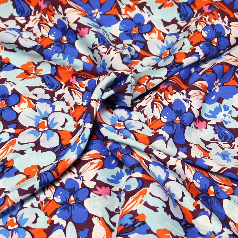 Étoffe 100% viscose - Fleuri ton bleu fond violet