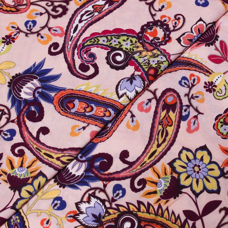 Étoffe 100% viscose - Cachemire multicolore sur fond rose pâle