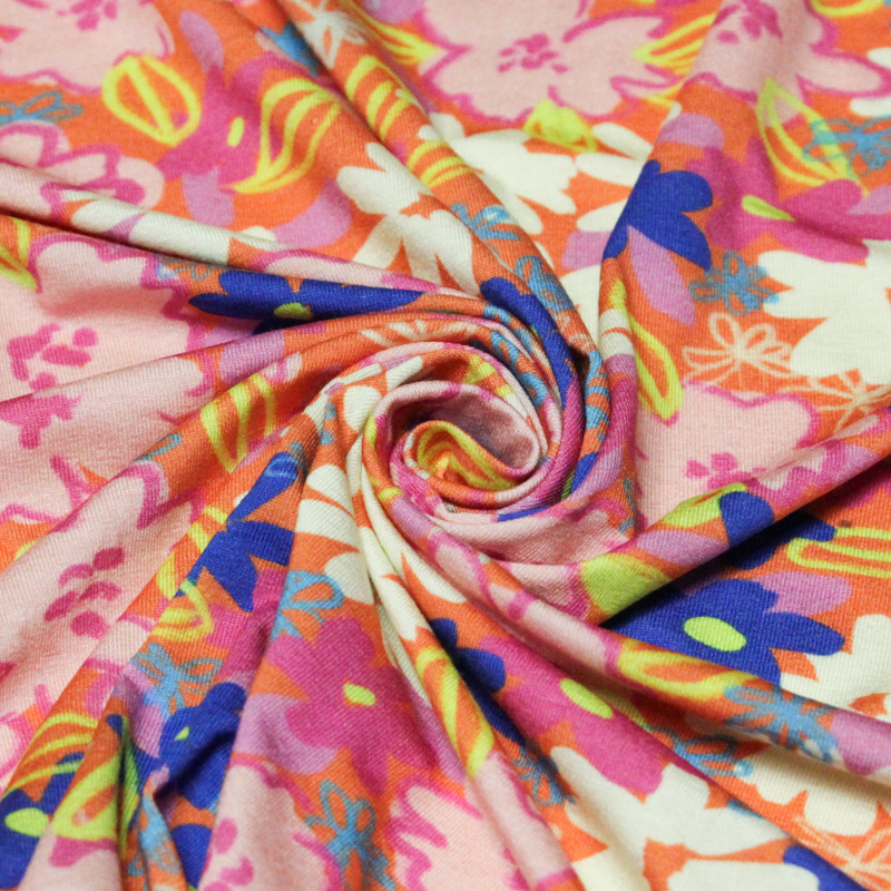 Jersey viscose & élasthanne - Fleurs roses sur fond orange