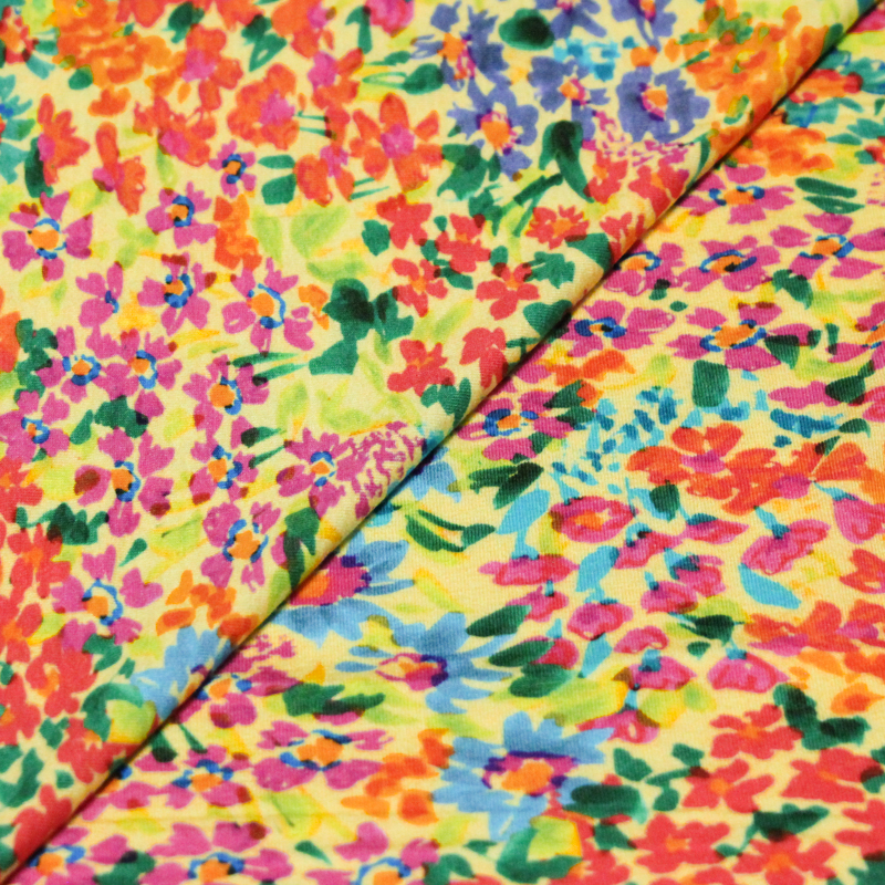 Jersey viscose & élasthanne - Fleurs rouges sur fond jaune
