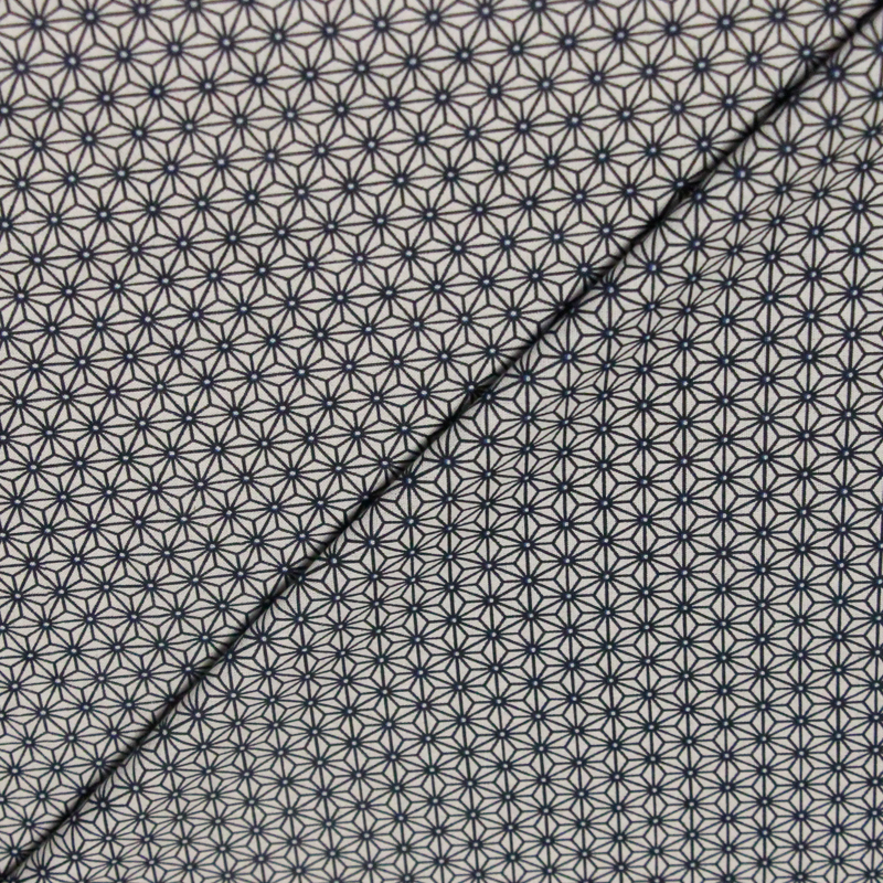 Cretonne 100% coton - Fleur géométrique bleu marine