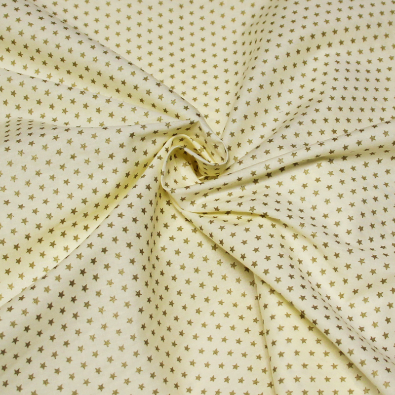 Popeline 100% coton - Étoile dorée fond jaune