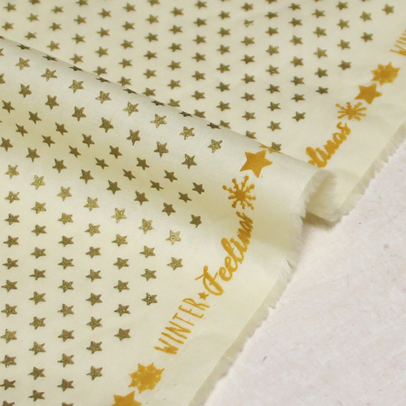 Popeline 100% coton - Étoile dorée fond jaune