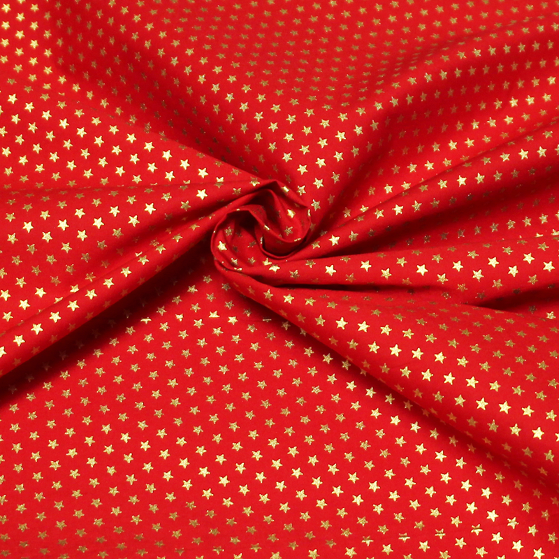 Popeline 100% coton - Étoile dorée fond rouge