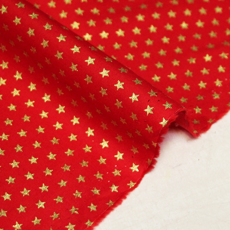 Popeline 100% coton - Étoile dorée fond rouge