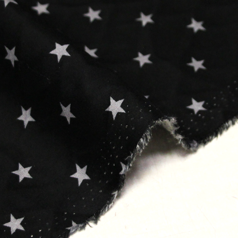 Popeline 100% coton - Étoile grise fond noir