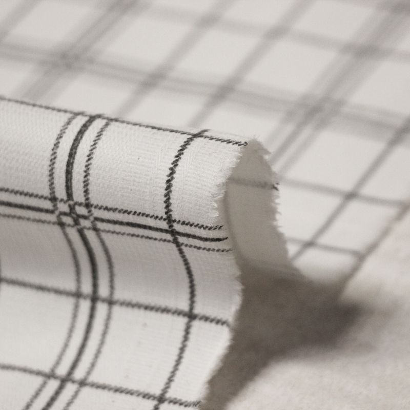 Gabardine sergé croisé coton & élasthanne - Carreaux gris sur fond blanc