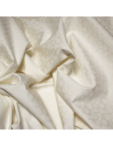 Gabardine coton & élasthanne - Broche fleuri ton-sur-ton blanc cassé