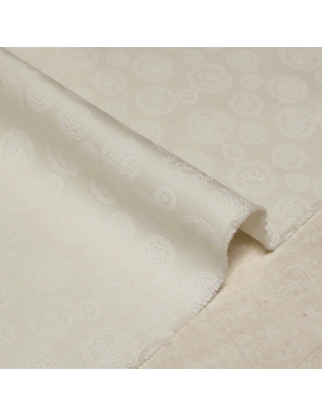 Gabardine coton & élasthanne - Broche fleuri ton-sur-ton blanc cassé