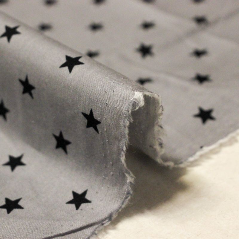 Popeline 100% coton - Etoiles noires sur fond gris