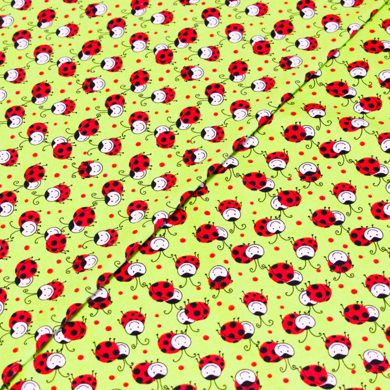 Jersey coton peigné & élasthanne – Coccinelles fond vert
