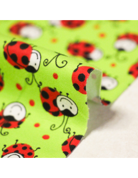 Jersey coton peigné & élasthanne – Coccinelles fond vert