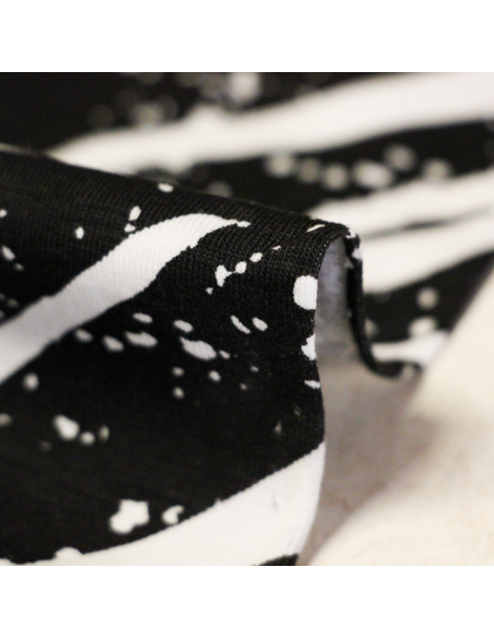 Jersey coton peigné & élasthanne – Coup de pinceau fond noir