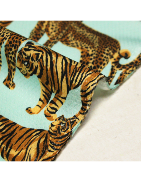 Étoffe 100% viscose piqué - Léopard & tigre fond turquoise