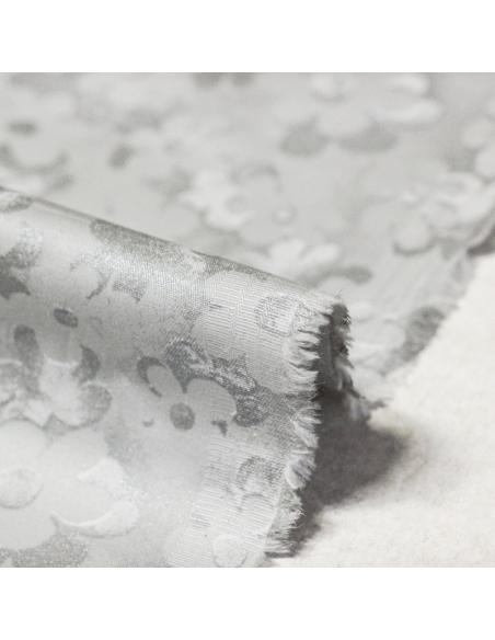 Gabardine coton & élasthanne - Fleurs argentées sur fond brillant