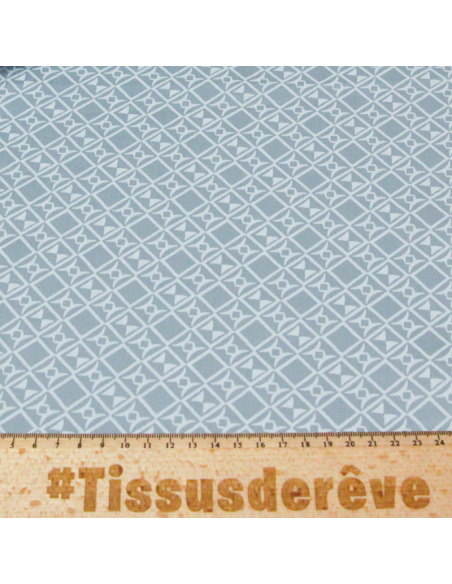 Gabardine coton & élasthanne - Motif géométrique fond bleu