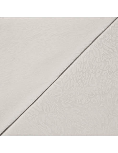 Gabardine floquée coton & élasthanne – Motif animalier blanc ton sur ton