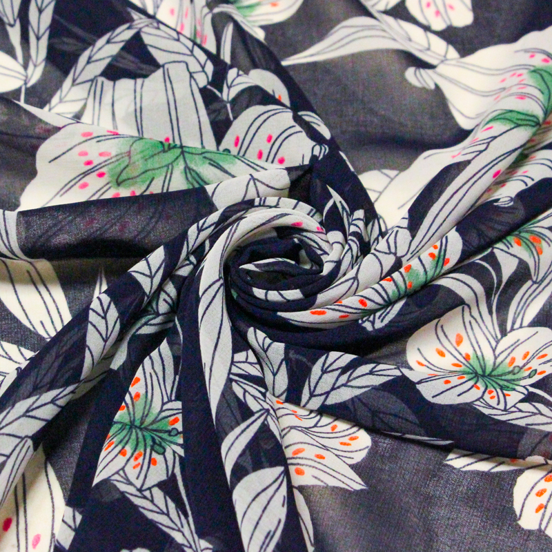 Georgette - Fleurs blanches fond marine