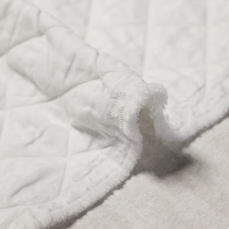 Tissu matelassé - Carreaux blanc