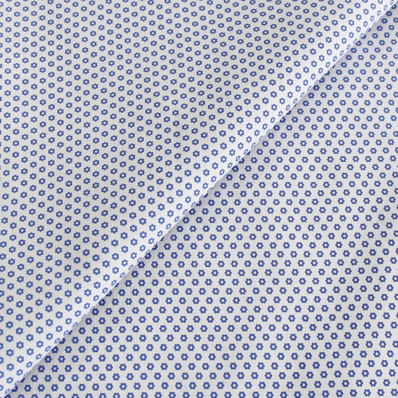 Percale 100% coton imprimé - Fleurs bleues sur fond gris