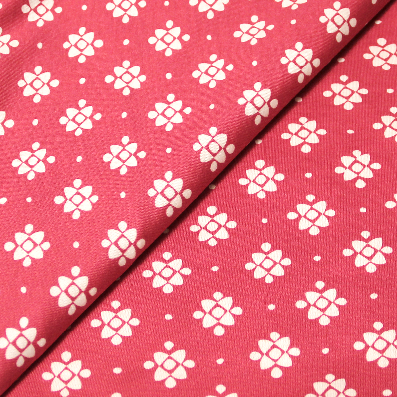 Jersey imprimé 100% coton - Fleurs graphiques rose & blanc