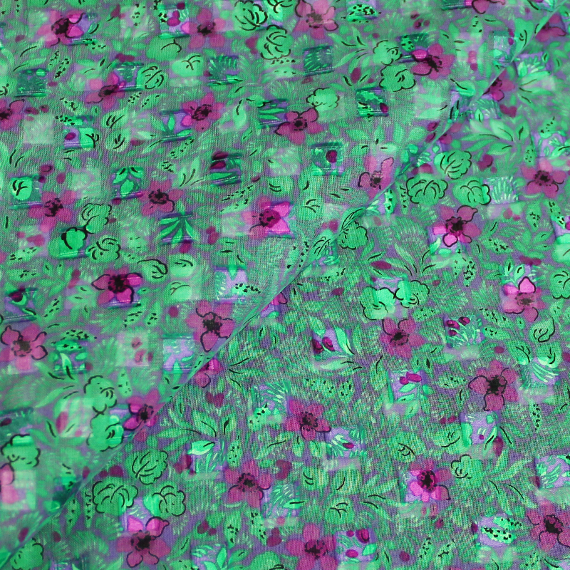 Crêpe Georgette Jacquard 100% soie - Fleurs fuchsia sur fond vert