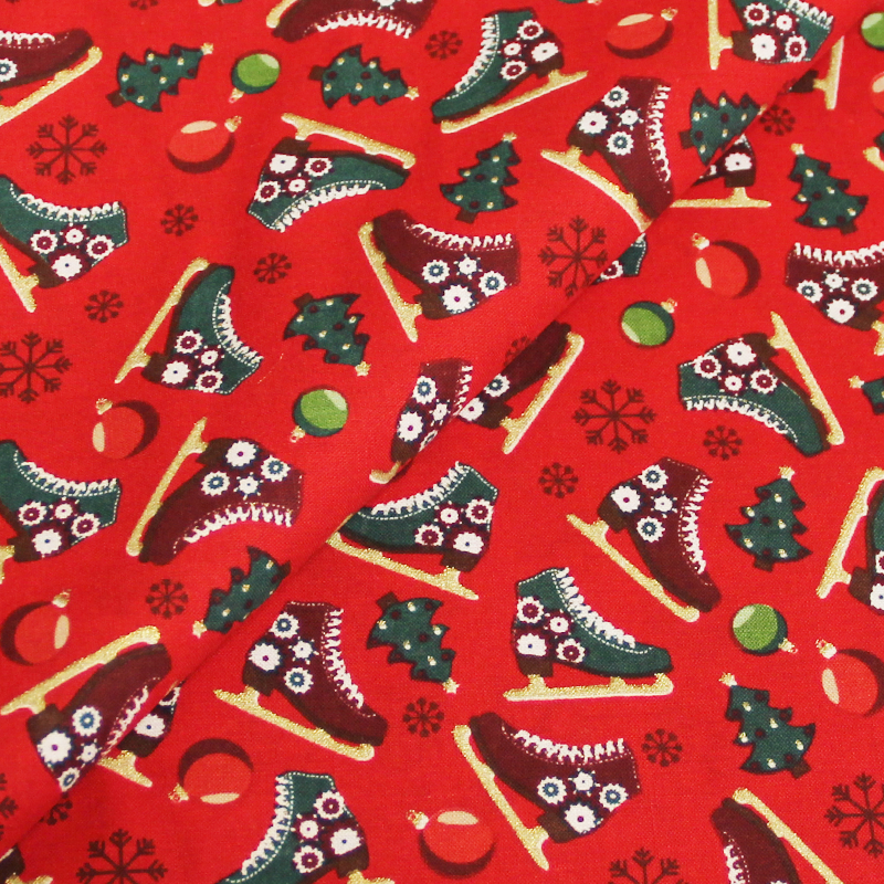 Coton imprimé spécial Noël - Patins fond rouge