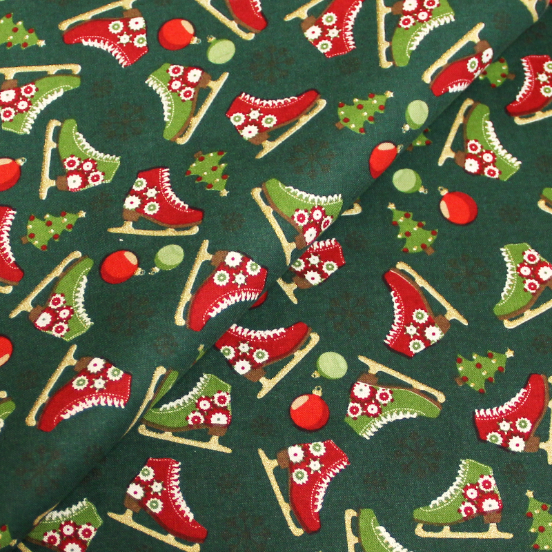 Coton imprimé spécial Noël - Patins fond vert