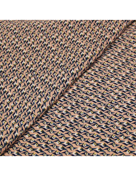 Javanaise - Fleur solitaire géométrique fond rose pâle