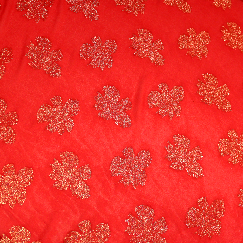 Mousseline de soie jacquard lancé découpé - Fleur rouge