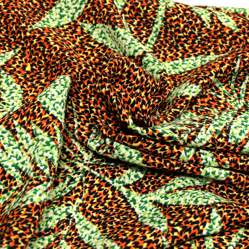 Javanaise - Palme vert fond tacheté orange