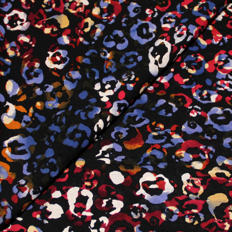 Crêpe Georgette imprimée - Léopard multicolore fond noir