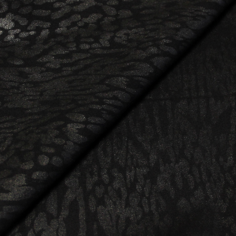 Gabardine 100% coton - Motif léopard pailleté noir