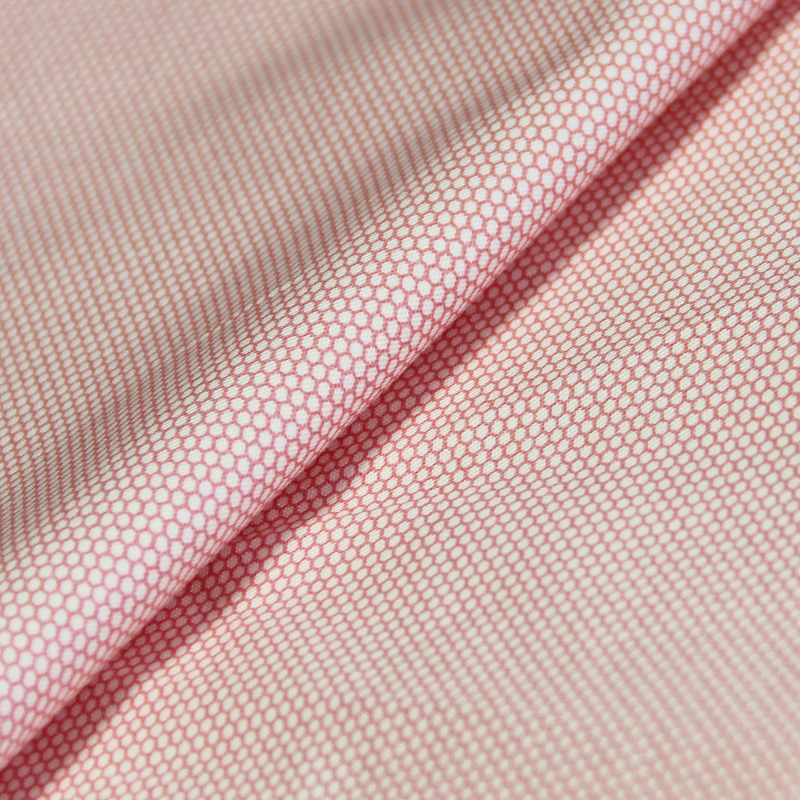 Gabardine coton & élasthanne imprimée - Hexagone blanc fond rose