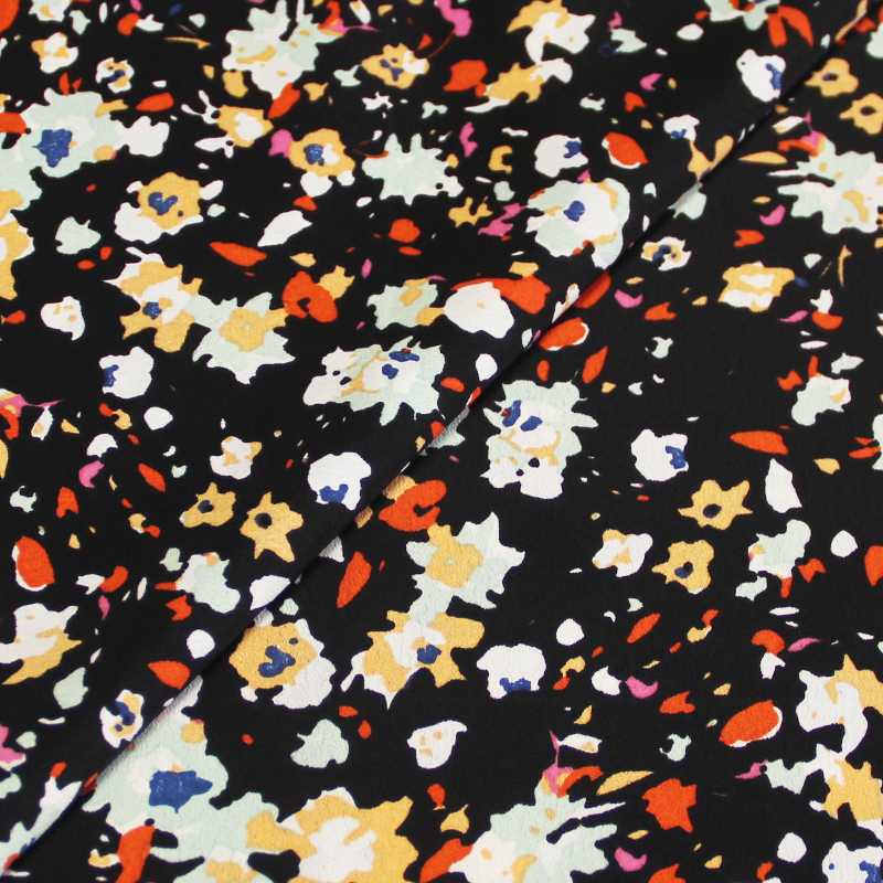 Crêpe 100% polyester - Bouquet floral abstrait multicolore fond noir