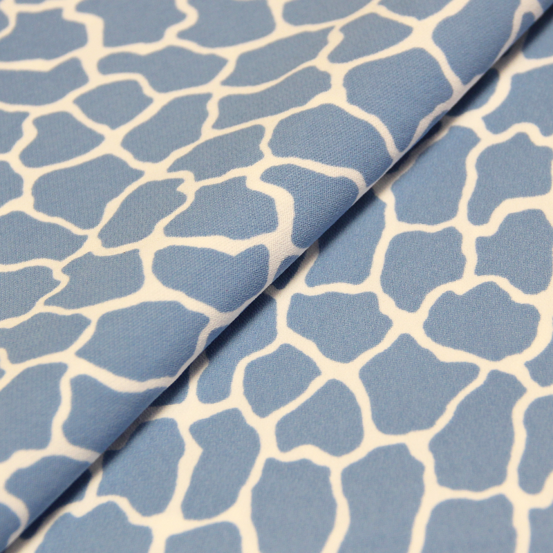 Crêpe lourd imprimé - Motif girafe bleu fond blanc