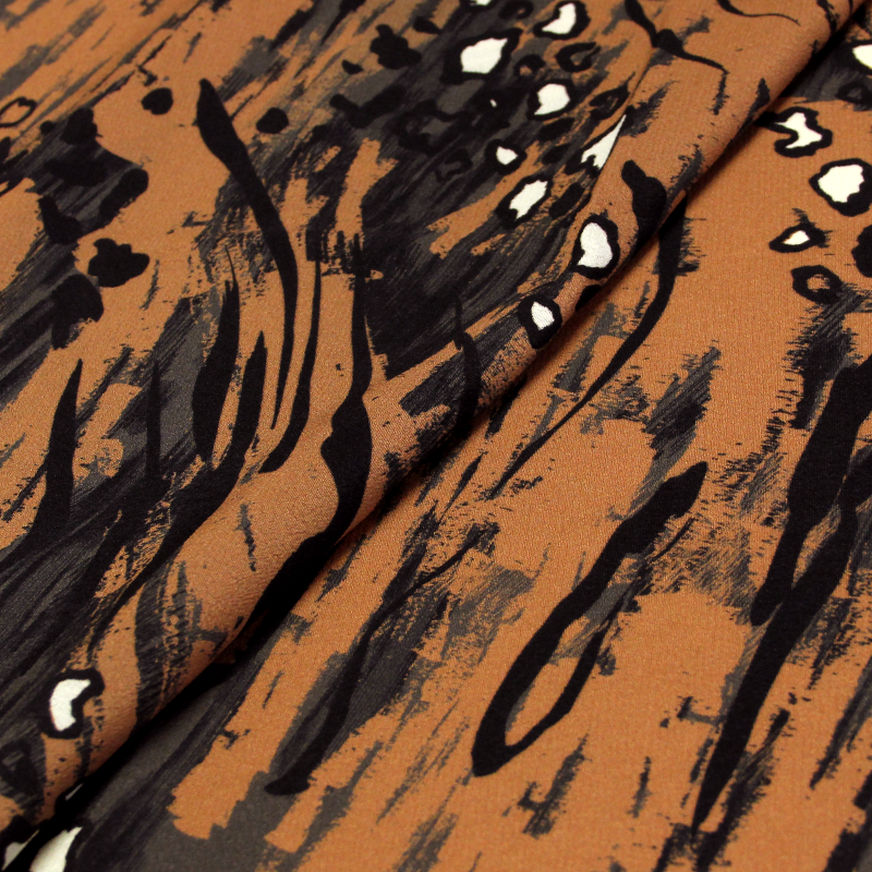 Crêpe 100% viscose - Motif abstrait animalier noir & marron