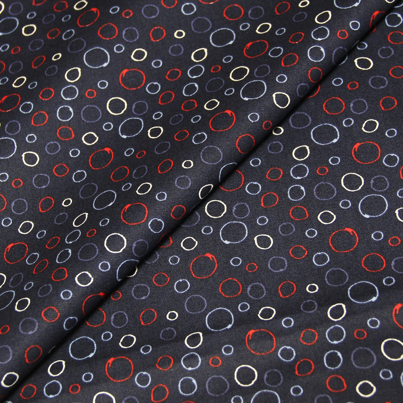 Popeline 100% coton - Dessin cercle camaïeu de bleus et rouge fond marine