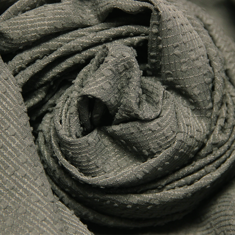 Mousseline piquée - Plumetis fond vert