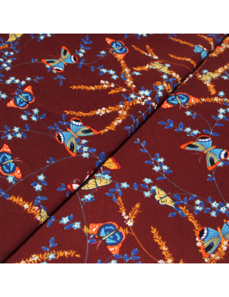 Crêpe bubble - Papillon fond bordeaux