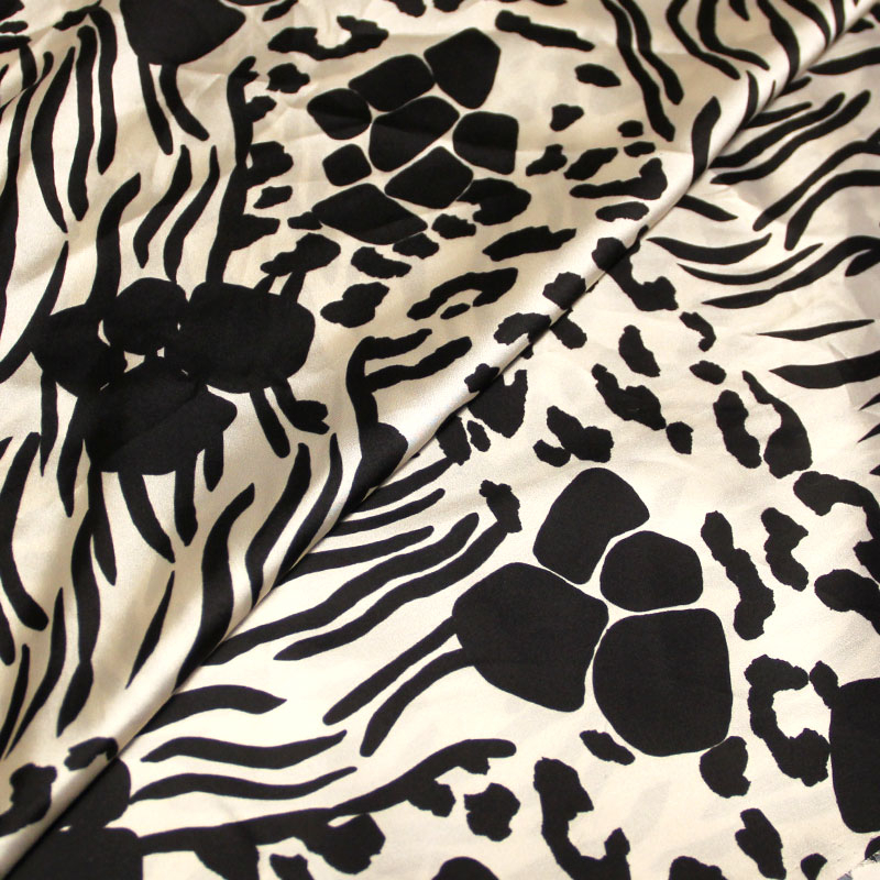 Satin 100% polyester - Tacheté animalier noir