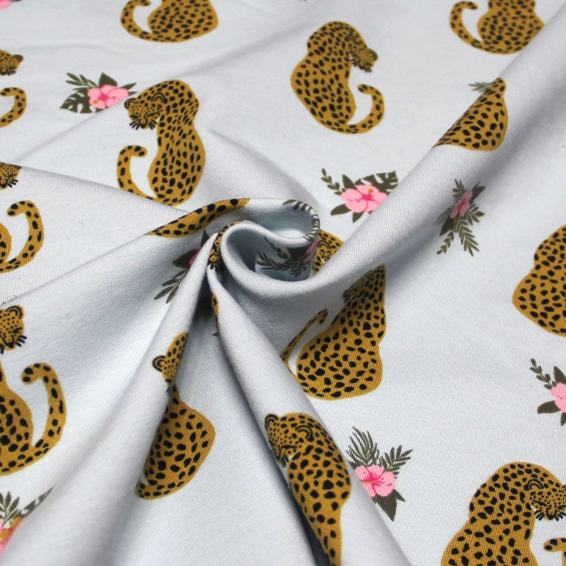 Molleton gratté - Léopard et fleur fond ciel