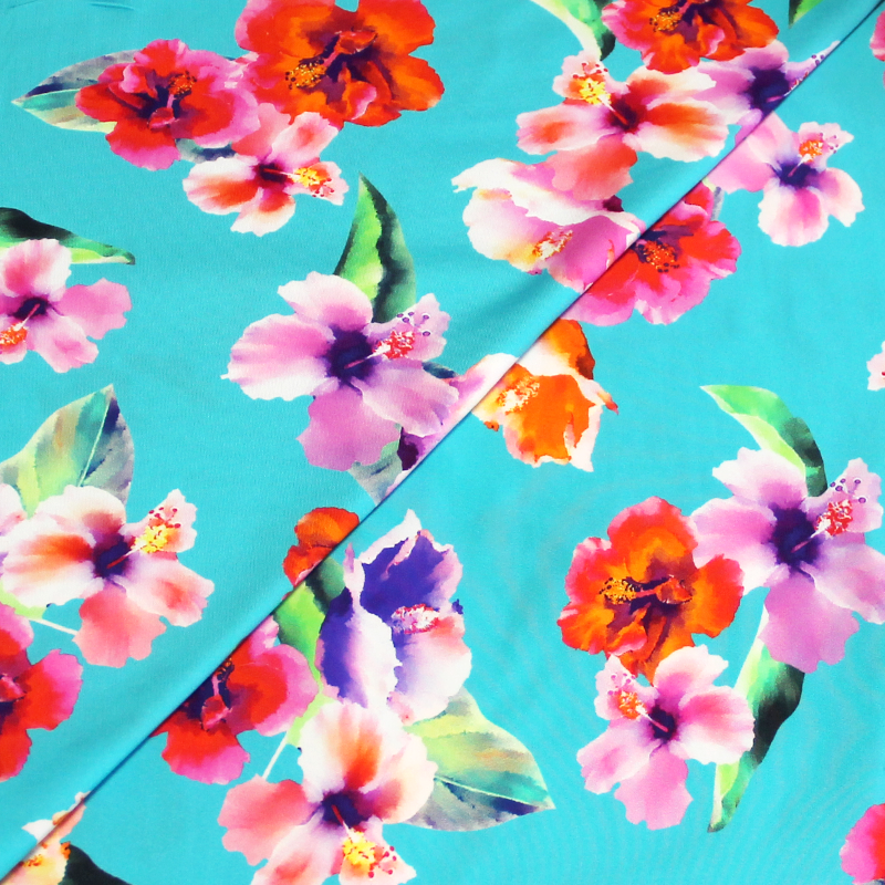 Tissu maillot de bain - Hibiscus multicolore fond turquoise