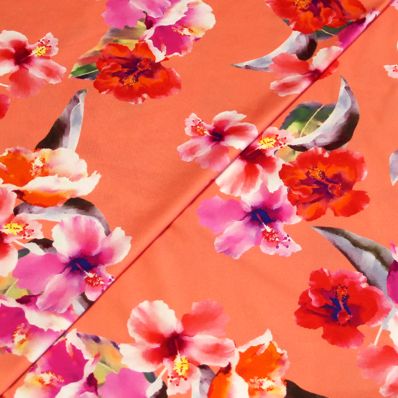 Tissu maillot de bain - Hibiscus multicolore fond corail