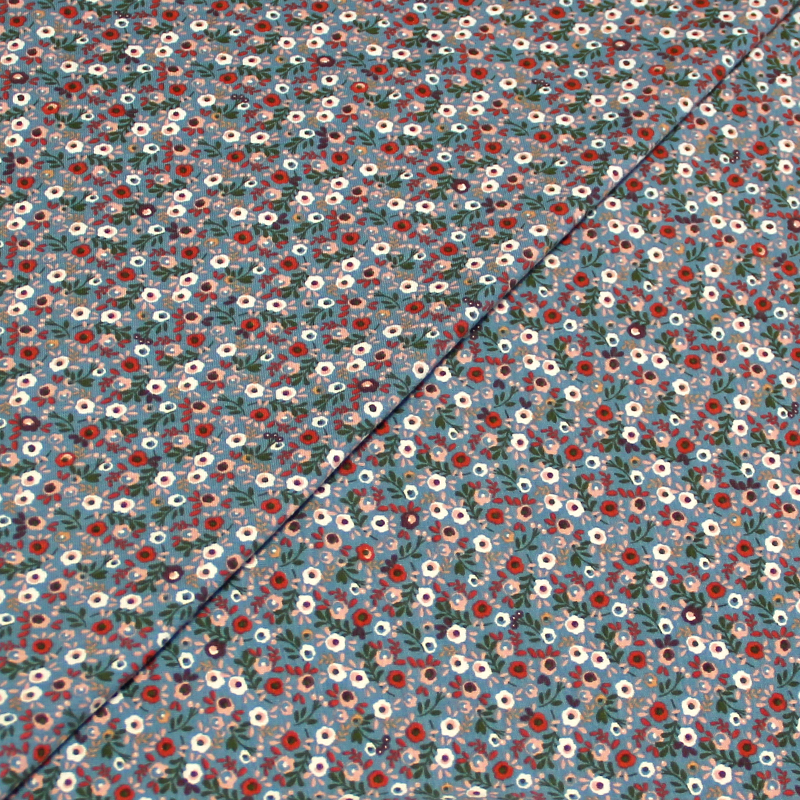 Jersey coton & élasthanne - Petite fleur multicolore fond bleu