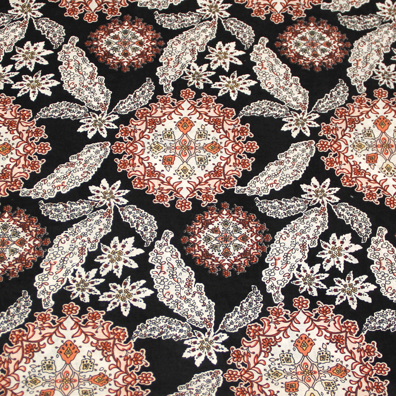 Batiste 100% coton - Rosace ton rose fond noir