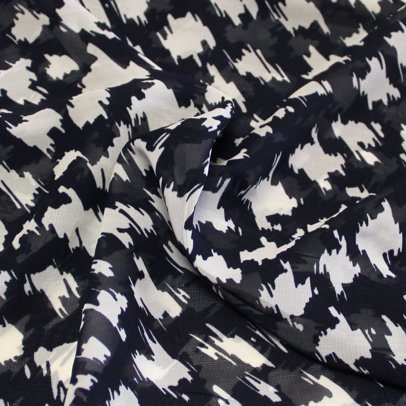 Georgette 100% viscose - Tacheté blanc fond marine