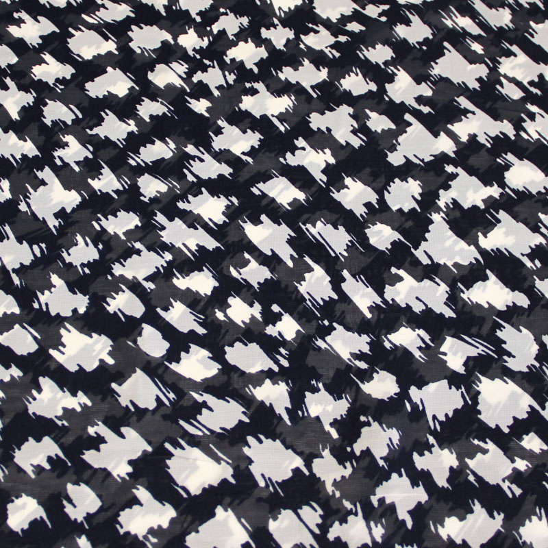 Georgette 100% viscose - Tacheté blanc fond marine